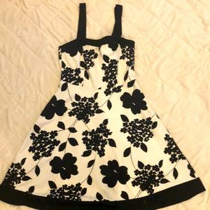 Never worn black and white print dress with removable straps. Size 8. AGB brand.